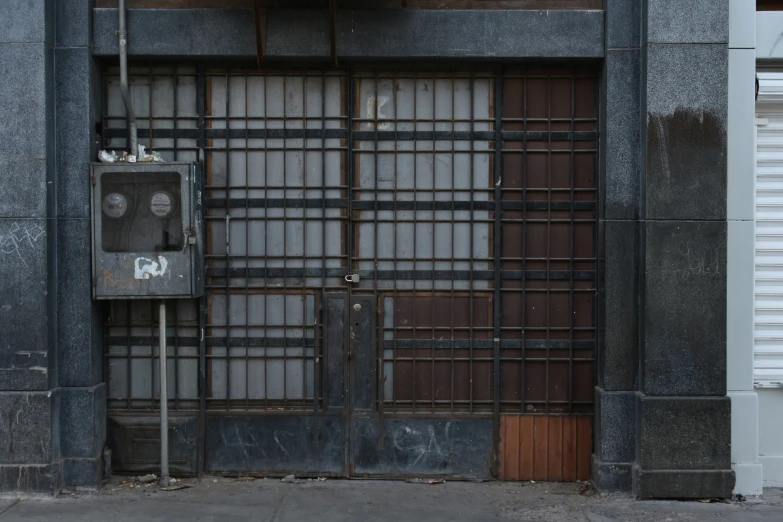 two door of some sort in an industrial area