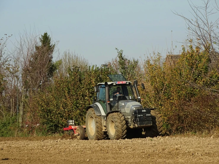 a tractor is in the middle of a field