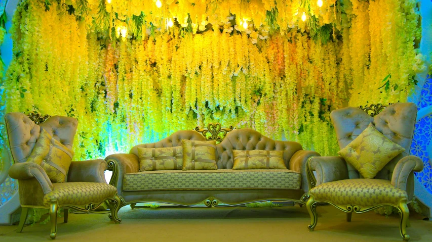 a living room decorated in a fancy yellow theme