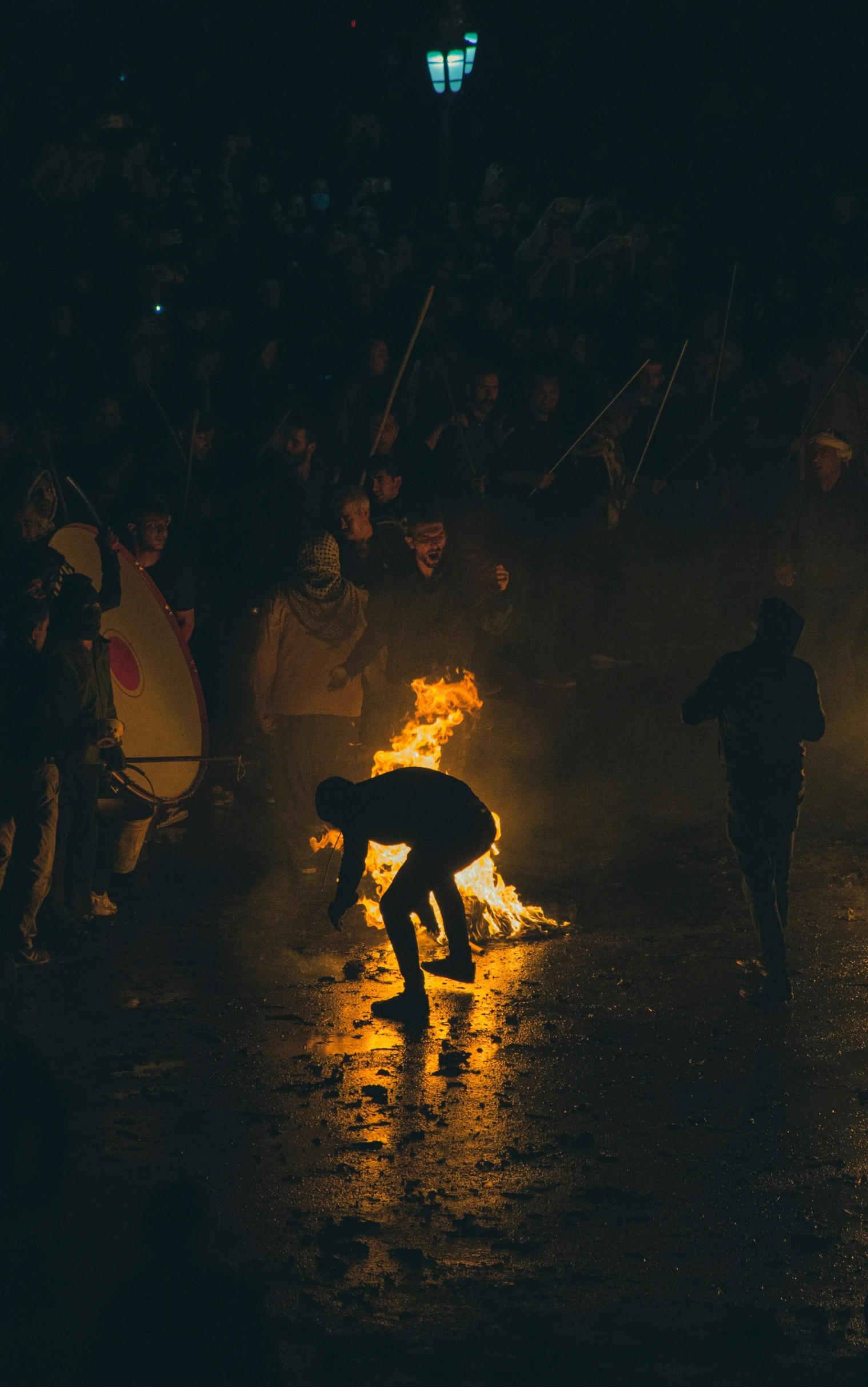 two people performing soing in the dark