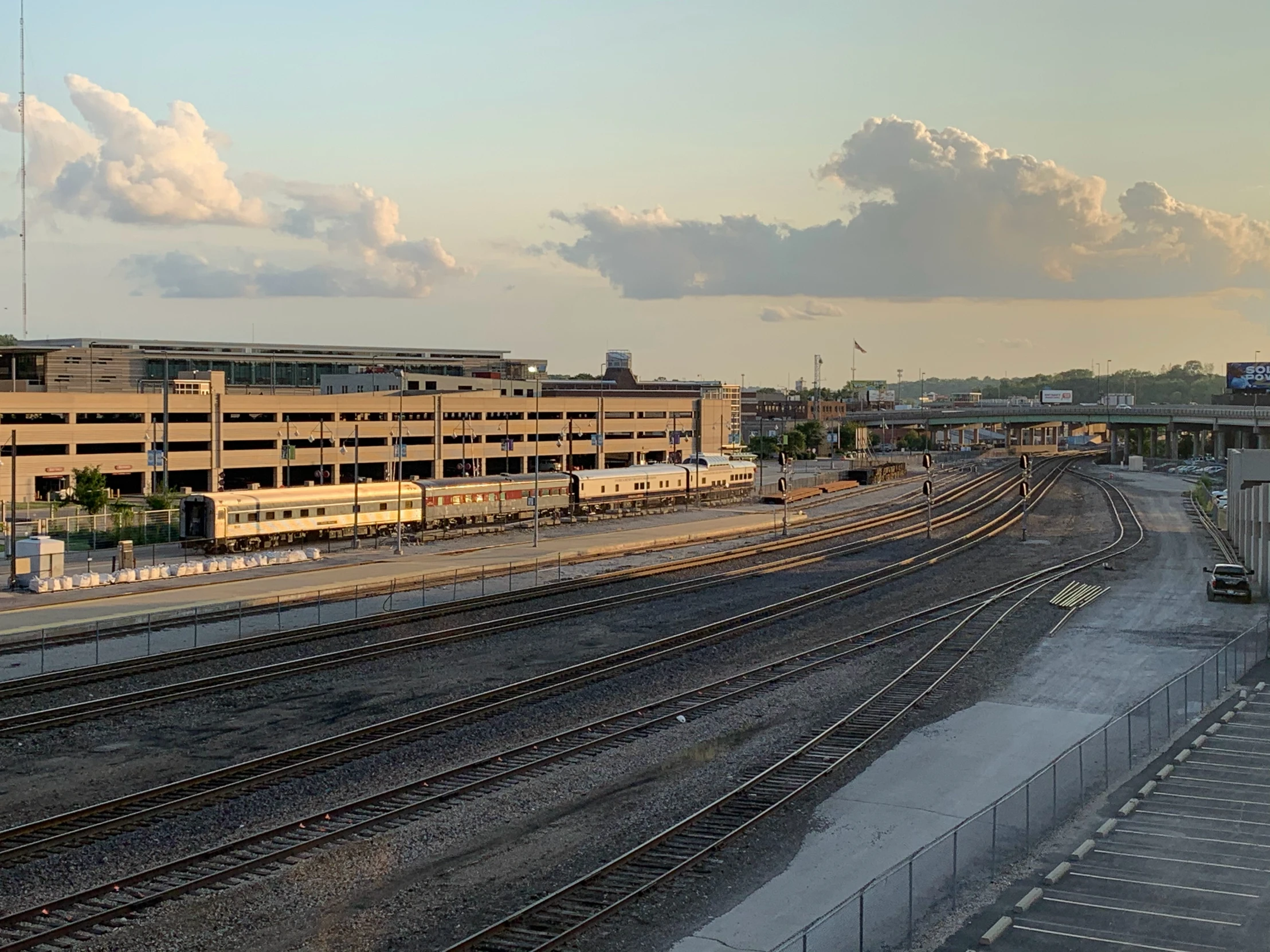 this is an image of train tracks in the middle of a city