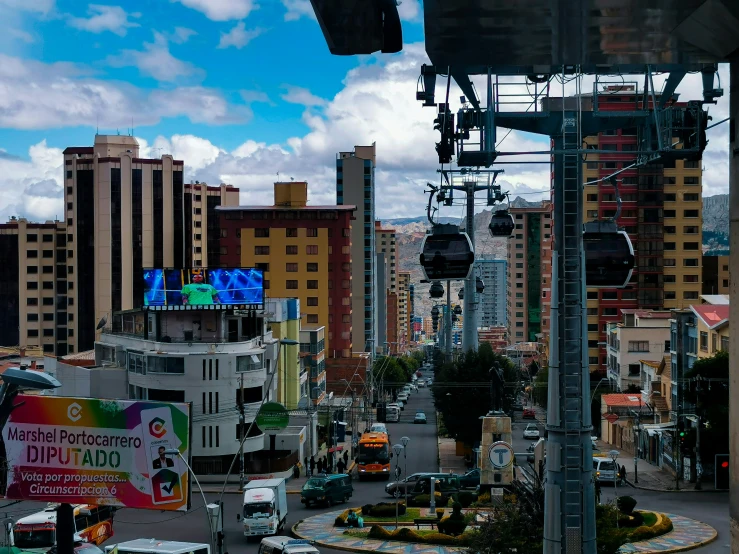 a city street is seen with buildings in the background