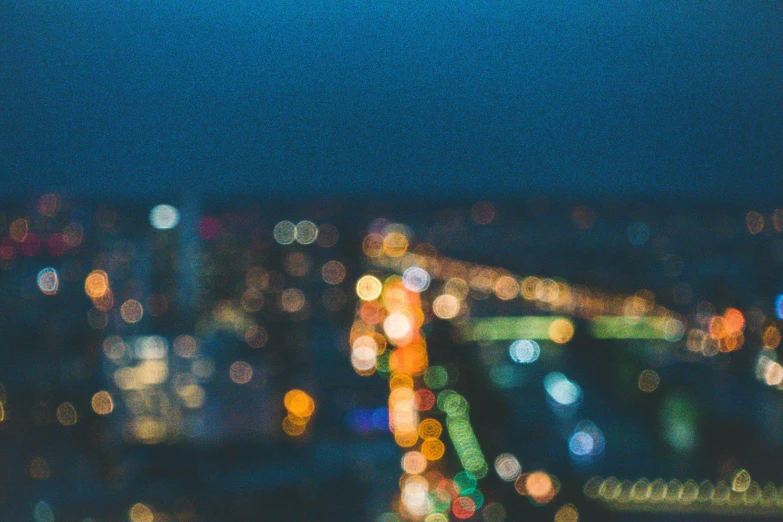 a blurry city lights over looking down at a street