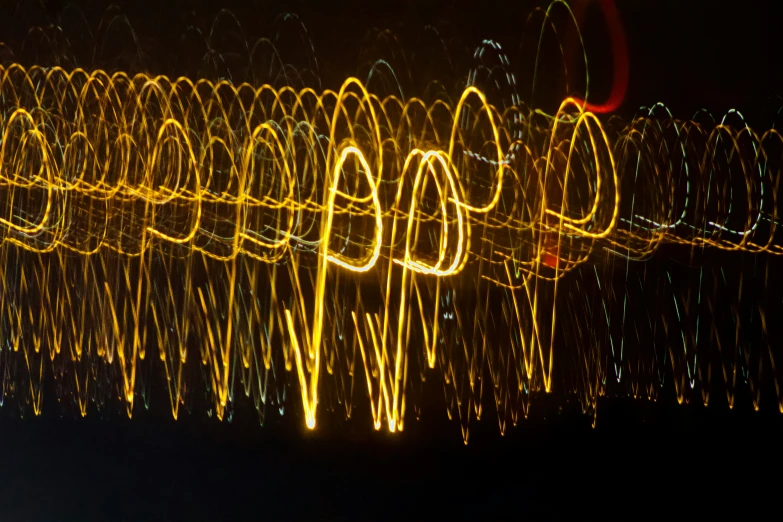 multiple lights are reflected in the water near trees