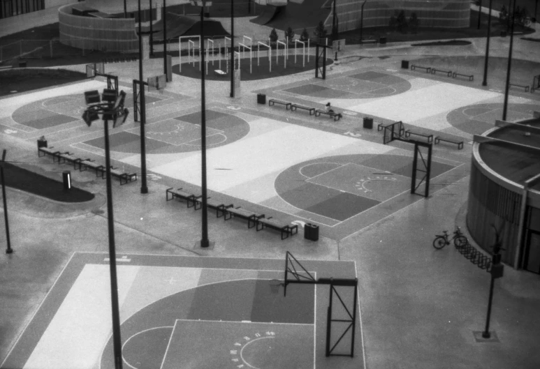 an overhead view of baseball park with benches and tables