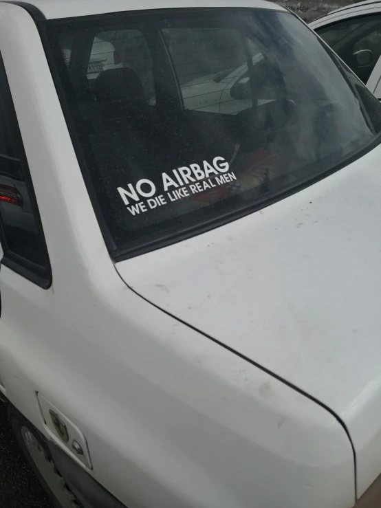 there is a no airbag sticker on the side of the car