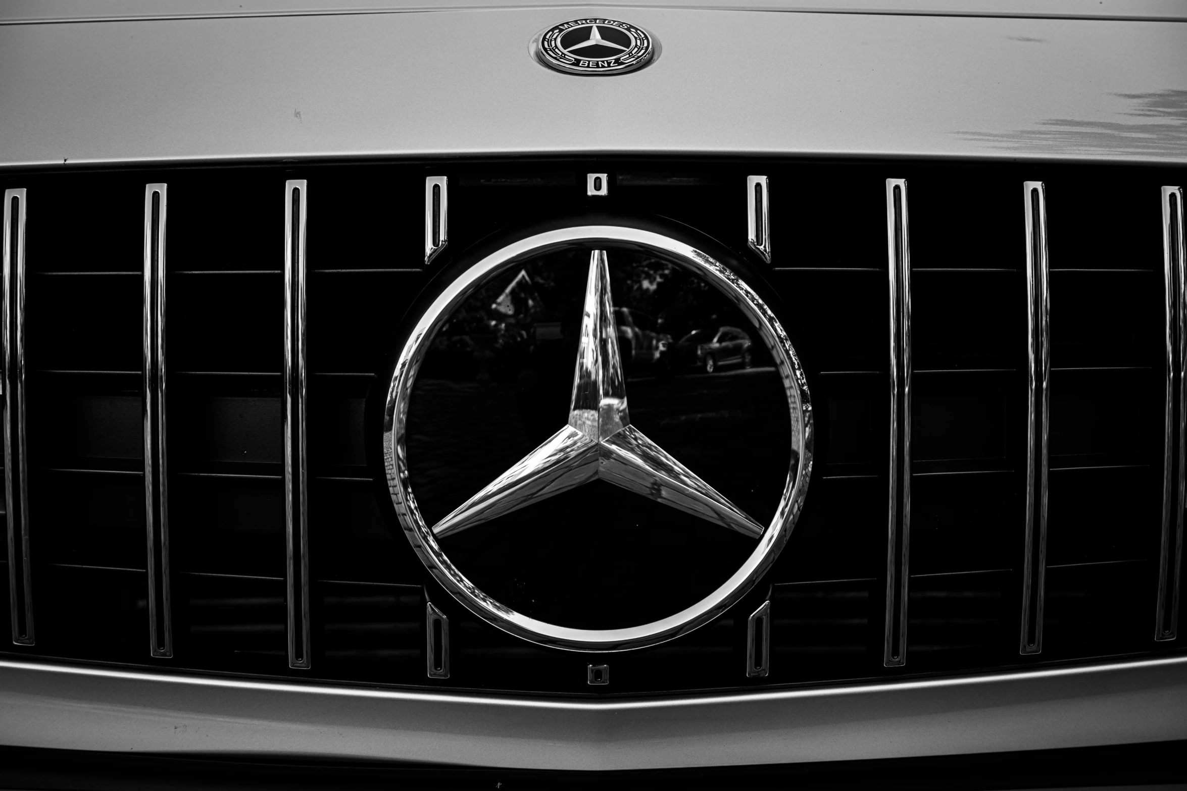 the emblem on a mercedes logo is seen