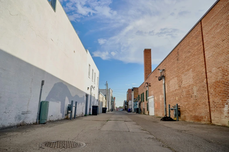 there are two buildings that have been built on this alley