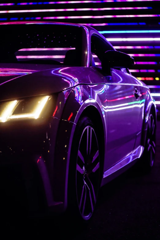 a car that is lit up with neon lights
