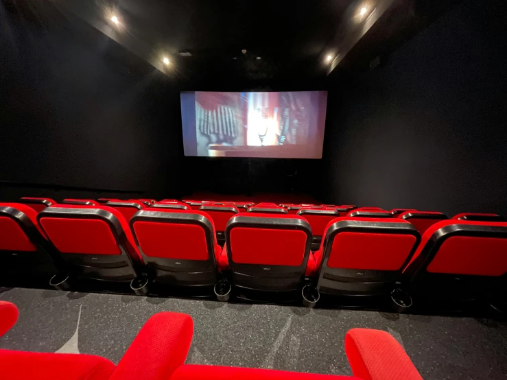 the view from the audience seat in a movie theater