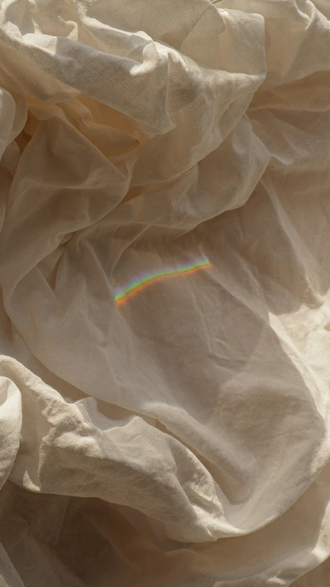 rainbow between the fabric that is very rough