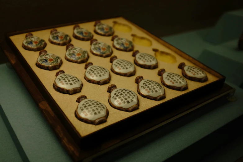 a board topped with cut out cookie dough