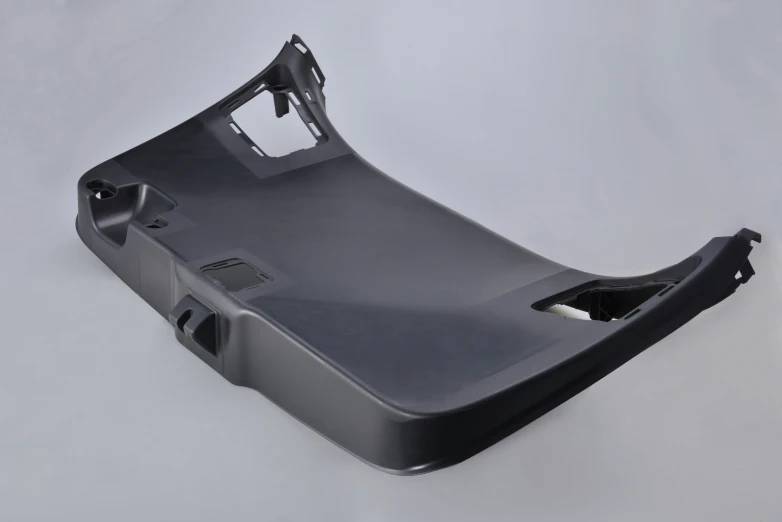 a gray seat with a steering wheel holder in it