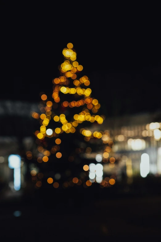 the image shows buildings and their lights in the dark