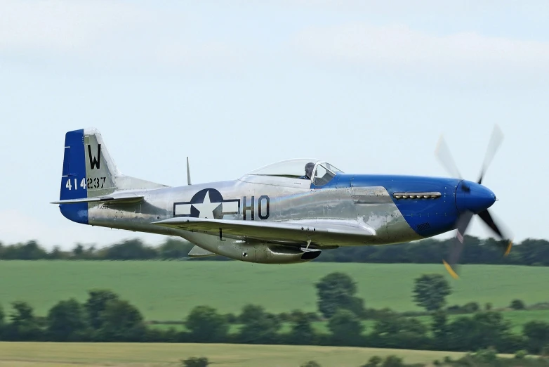 the airplane has two propellers and one is painted white