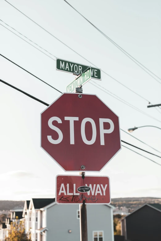 a stop sign has two signs above it that says mayor joe and all way