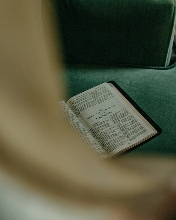 a book on a chair with the word of israel in it