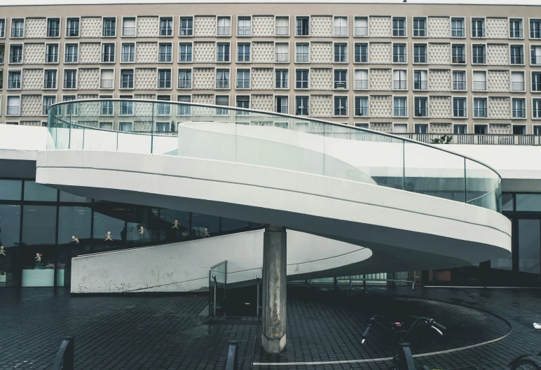 a big building with a long stair case on top