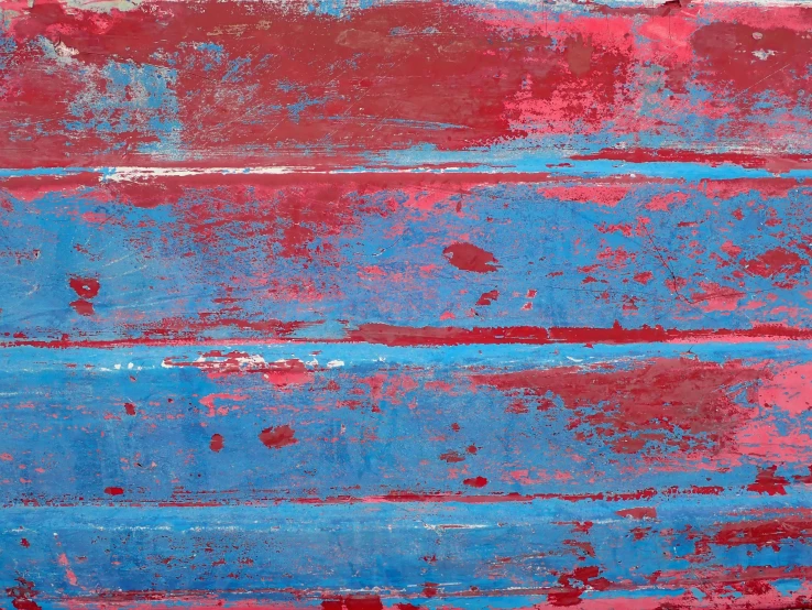 abstract red and blue art work with paint drips