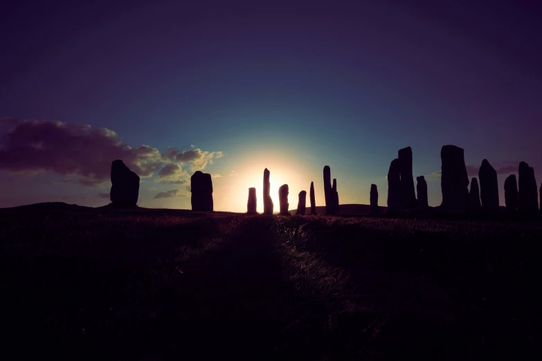 a very large circle of stones in a big field