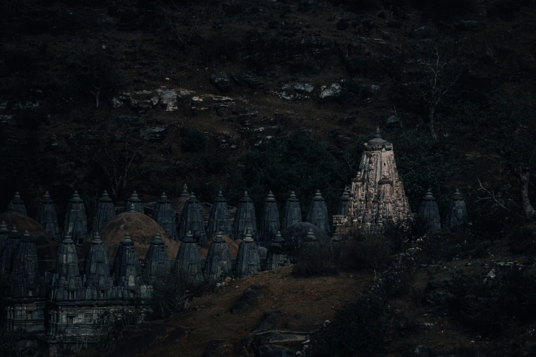 an old cemetery is dimly lit by dark lighting