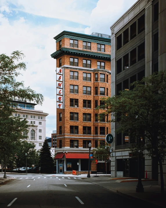 a building that is brown in color on a street