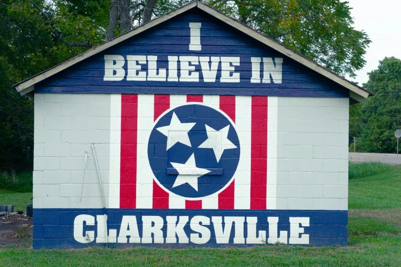 there is a colorful sign that is on the side of a building