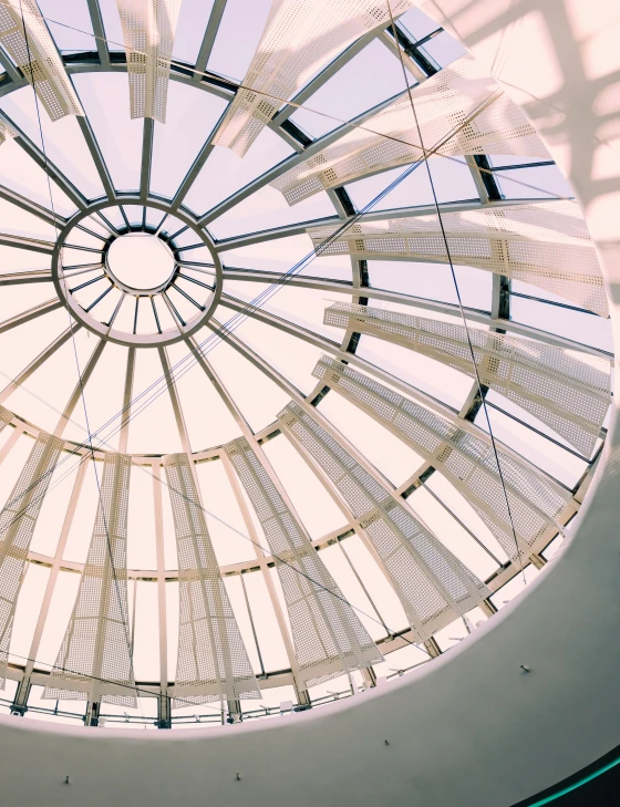 an image of a circular glass ceiling with lights on it