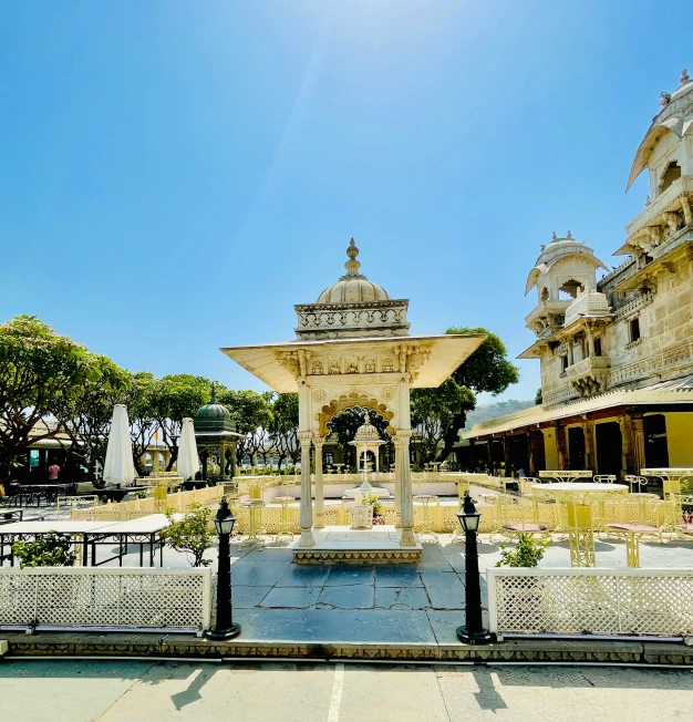 a view of a fountain from across a road