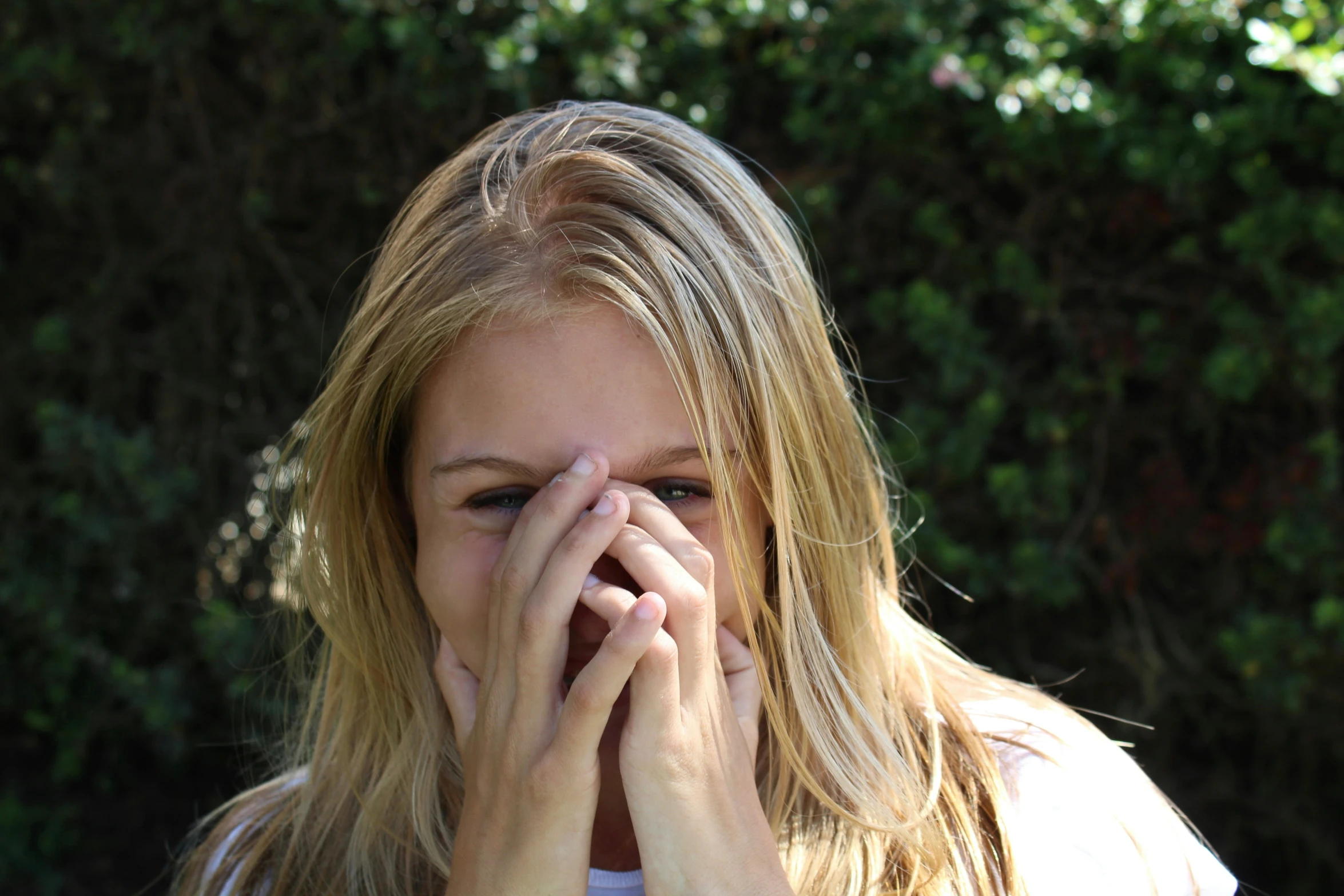 a blond woman looking concerned about soing