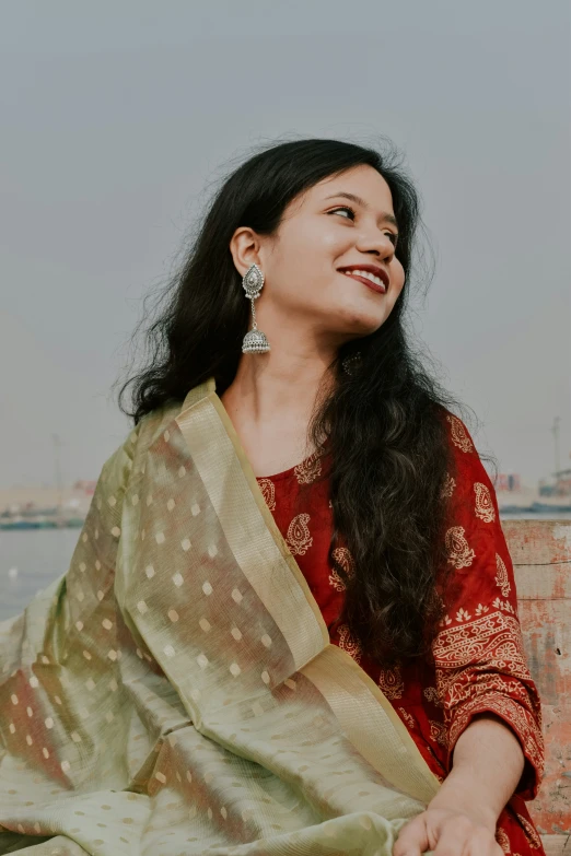 an image of a woman wearing a sari