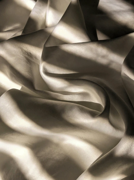 shadows cast on a white, dry fabric