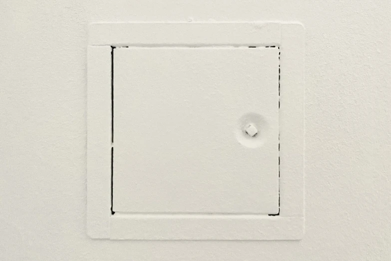 a white piece of artwork that looks like an optical square