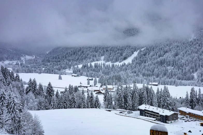 a snowy view of the mountains in winter