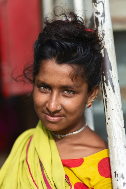 a woman with short hair smiling for the camera