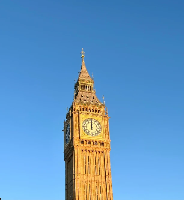 a tall building with a clock in the center