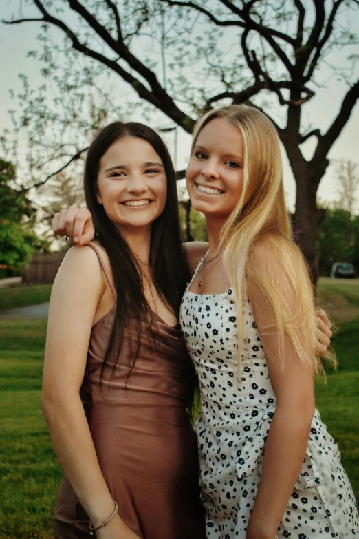 two young women smiling for the camera