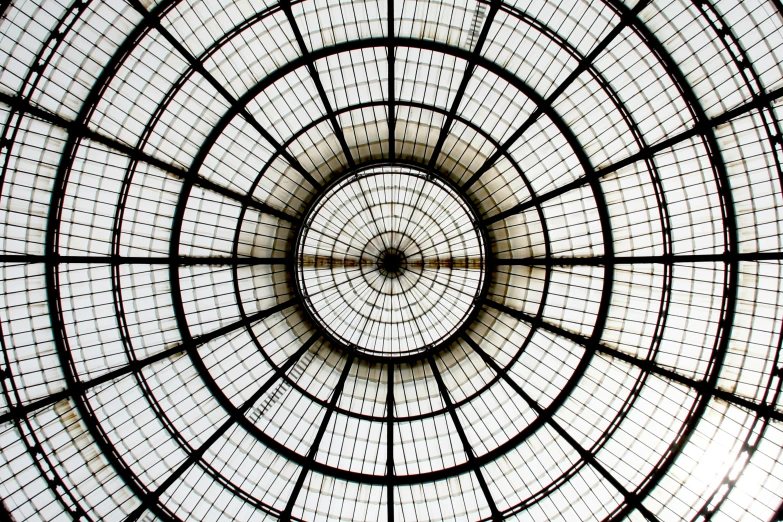 an intricately designed ceiling that has circles and squares