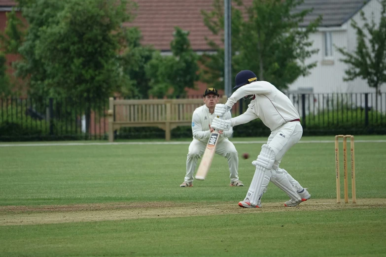 the player is getting ready to hit the ball