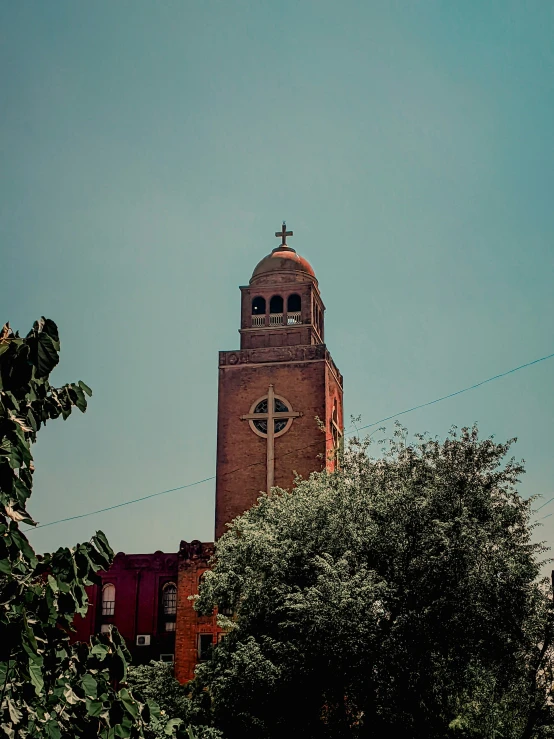 a church that has a cross on the top