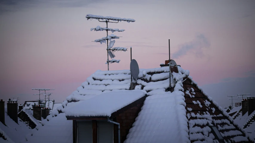 the rooftop of a building in the middle of winter