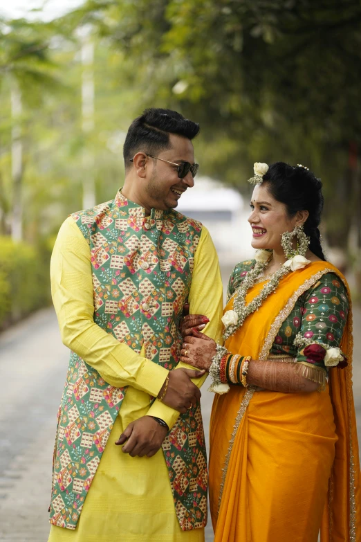 a man and woman standing next to each other