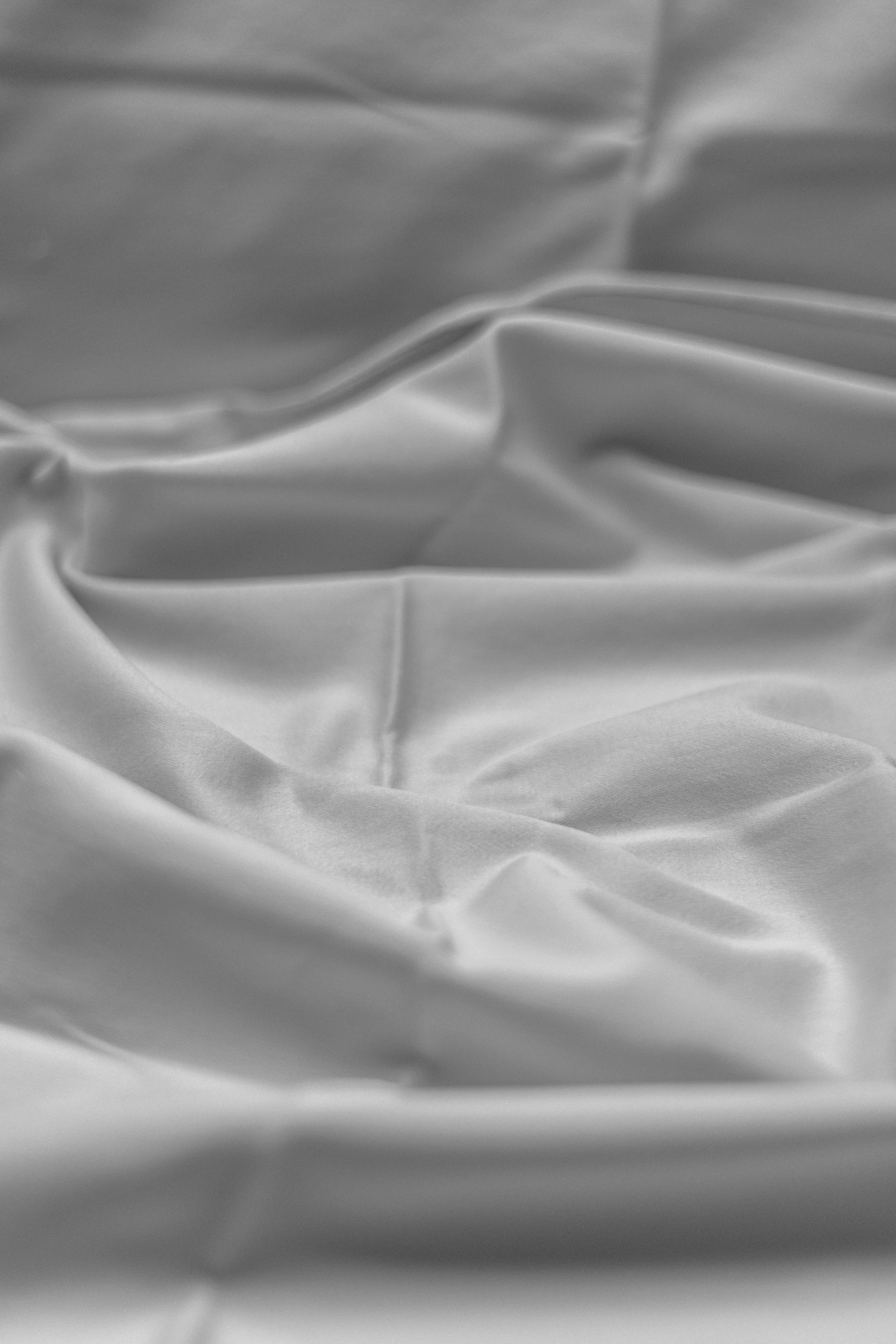 a black and white po of a sheet of silk