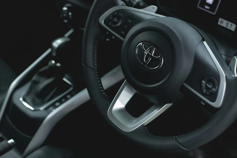 the steering wheel on a vehicle in a room