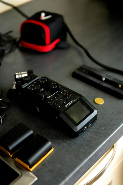 many electronic devices are lined up on the table