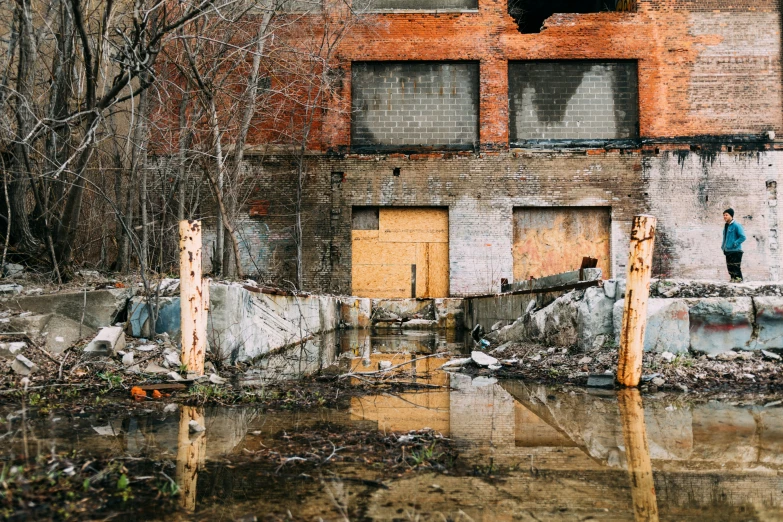 an old rundown building that looks dilapidated with graffiti