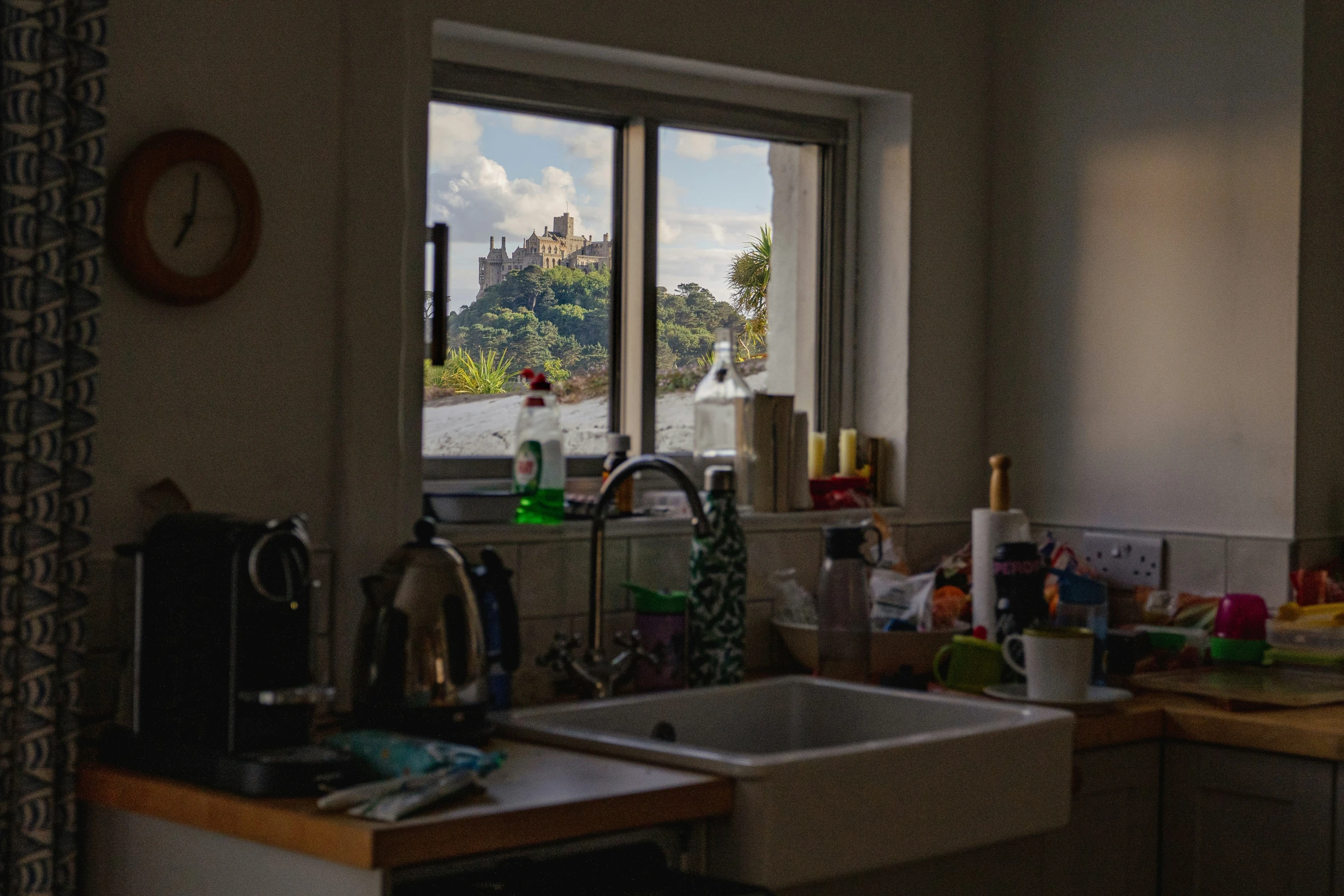 a kitchen with a window to the outside