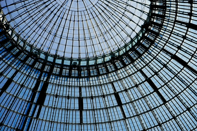 looking up at the glass roof of the shopping mall