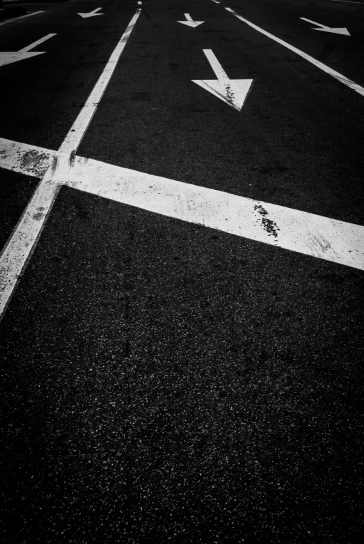 black and white pograph of empty road markings