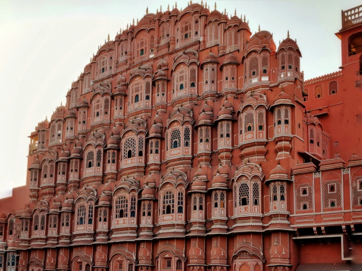 an ornate brick building with windows and carved - in - stone designs